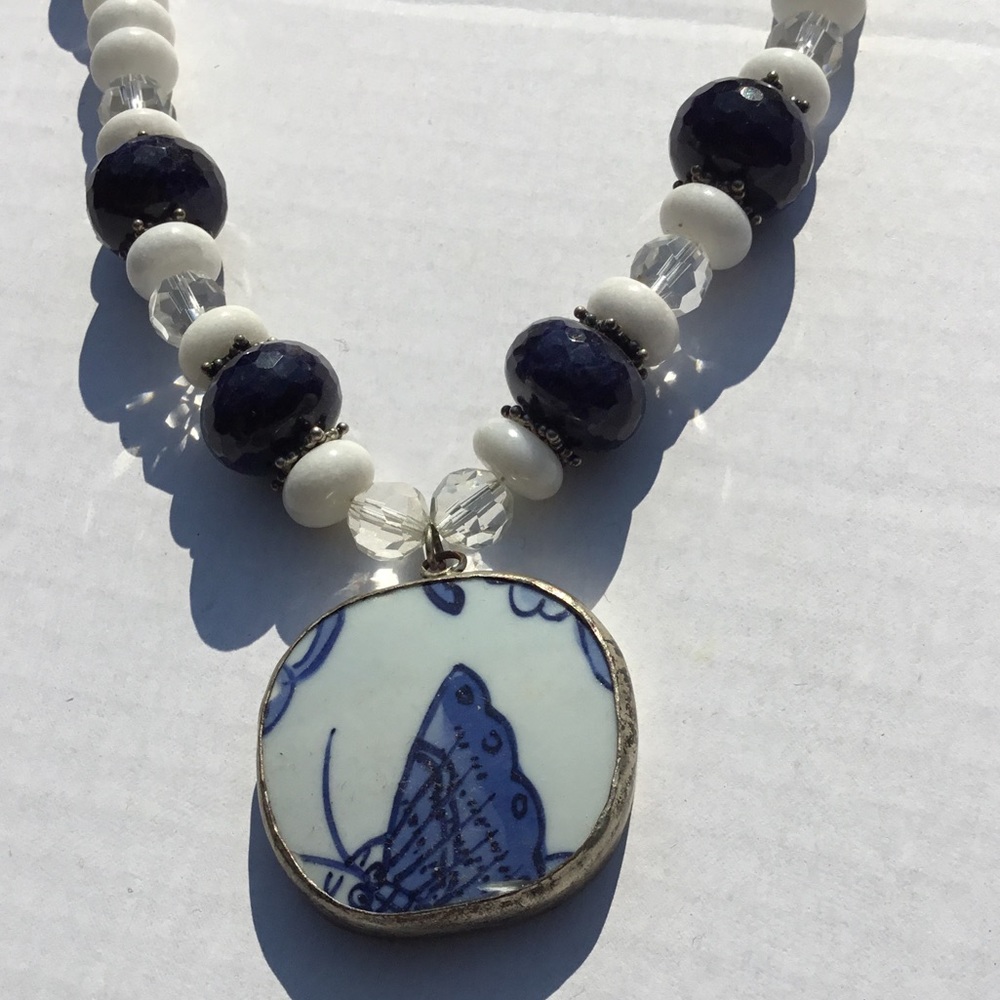Blue beaded butterfly pendant necklace